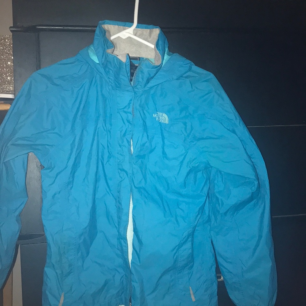 Blue The North Face rain jacket